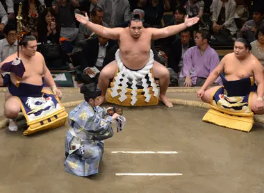 Ritual within the dohyo featuring the Yokozuna