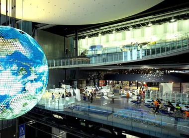 The present Miraikan Tsunagari, a huge globe suspended in the air on several levels.