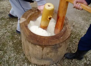 Making mochi, small balls of glutinous rice, made family for New Year.