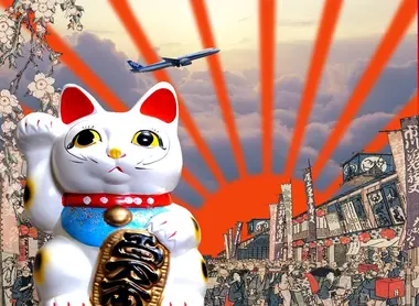 A classic maneki neko cat for good luck