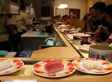 Kaitenzushi plates Close-up of a kaitenzushi's conveyer belt sushi