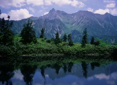 Mont Yarigatake is reflected in the crystal clear waters of the mountain lakes