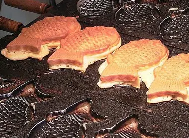 Taiyaki cooking in their fish-shaped moods
