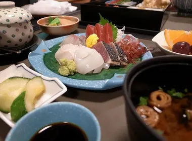 A Japanese meal featuring sashimi