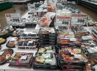 stall selling fresh cooked food 'bento box' Supermarket stall