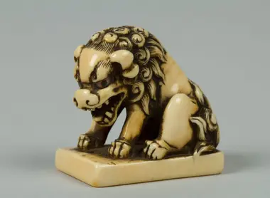 Netsuke représentant un lion Netsuke représentant un lion