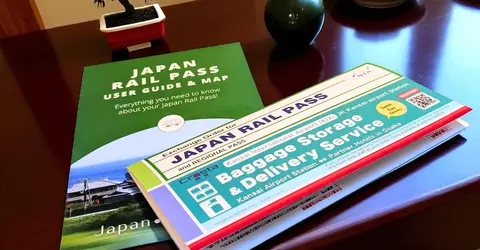 Voucher Japan Rail Pass on a table