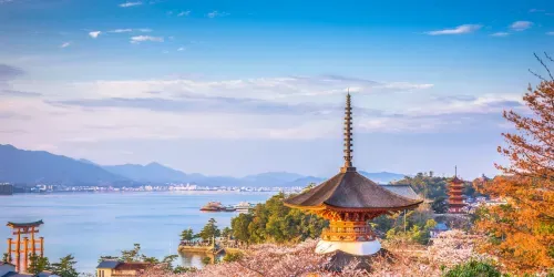 The sacred island of Miyajima and its famous torii with feet in water, worth a visit off Hiroshima in Japan