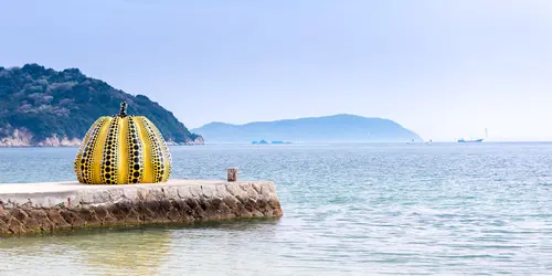 Yayoi Kusama's yellow pumpkin, symbol of Naoshima, the artistic island in Japan Inland Sea