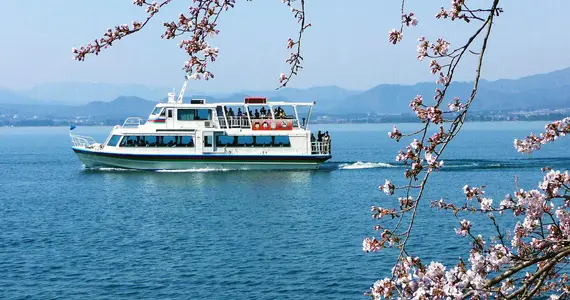 Many boats take surfing since Otsu Lake Biwa.