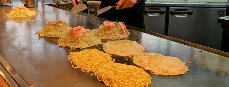 Okonomiyaki on the griddle 
