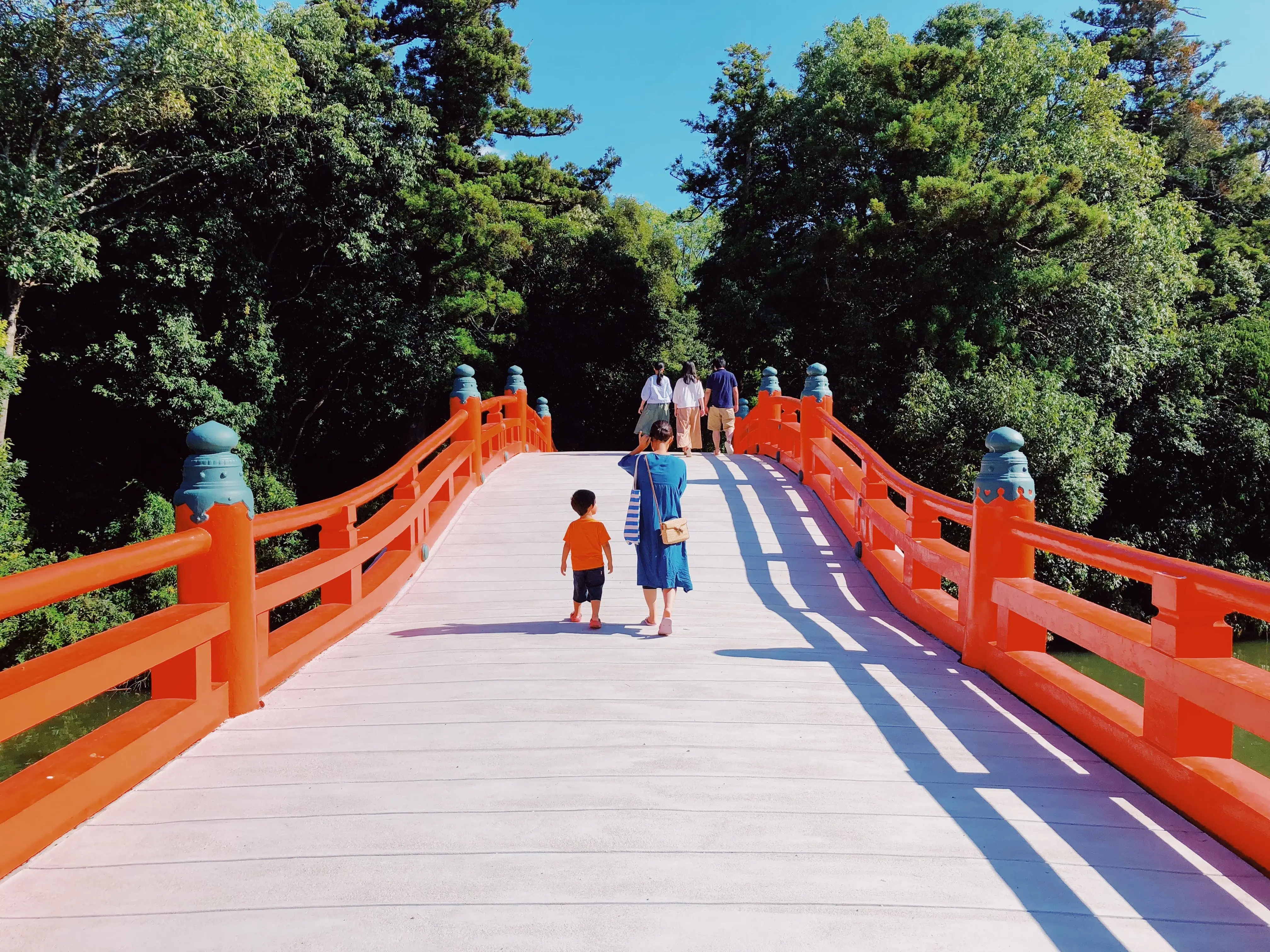 People walking on a bridge in Japan